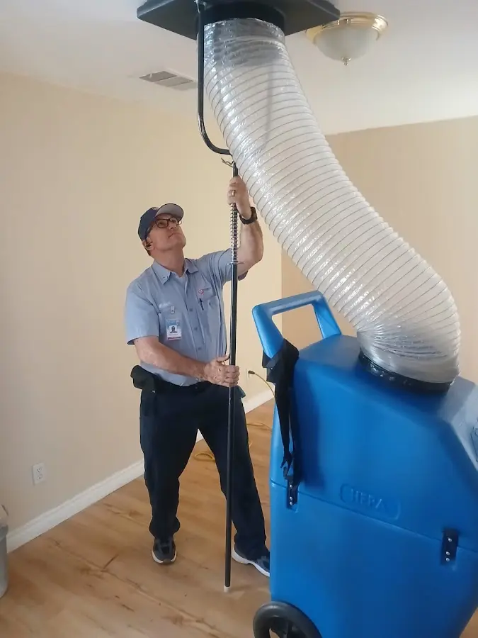 Mini Split Installation technician using HEPA equipment in Estero